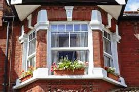 Replacement PVC-U 'A' rated vertical slider double glazed windows