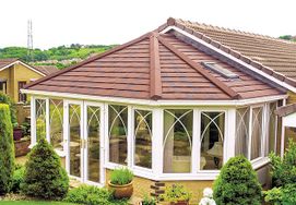 Custom made conservatory with insulated tiled roof
